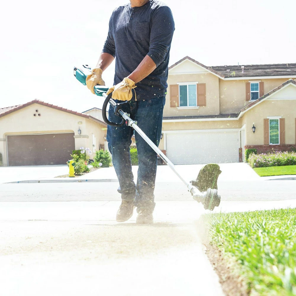 Makita XUX02SM1X3 18V LXT Brushless Lithium-Ion Cordless Couple Shaft Power Head Kit With 13 In. String Trimmer And Blower Attachments (4 Ah) 14 Makita XUX02SM1X3 18V LXT Brushless Lithium-Ion Cordless Couple Shaft Power Head Kit With 13 In. String Trimmer And Blower Attachments (4 Ah) - Image 12